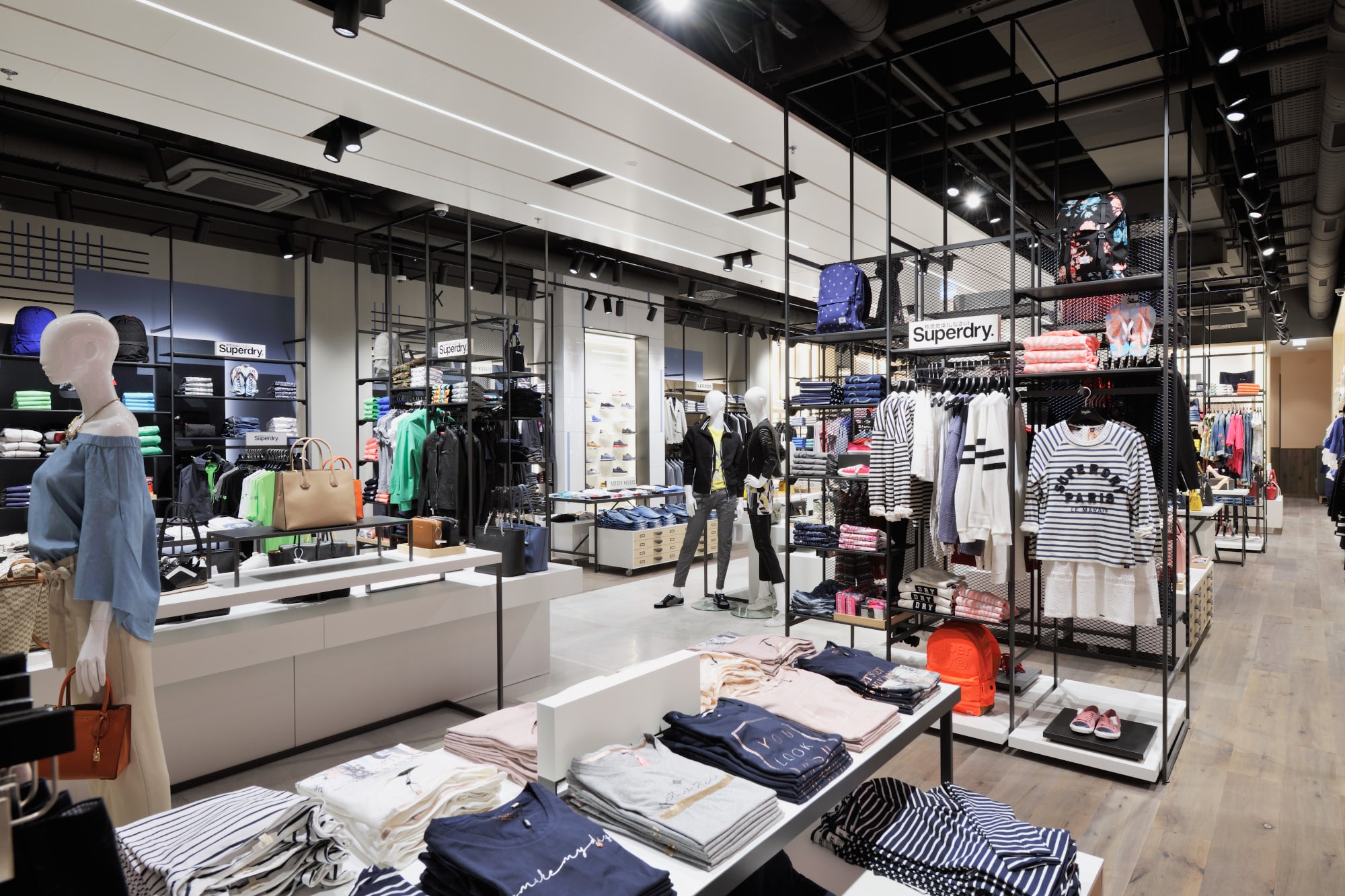 Minimalistic shelves design in XYZ Villach store