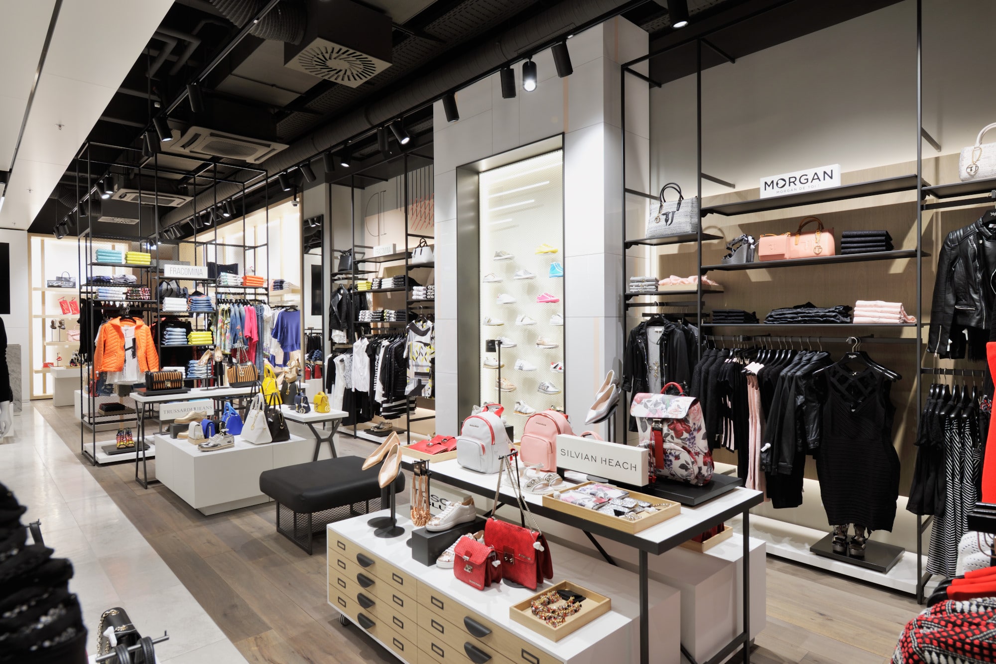 Minimalistic shelves in XYZ Villach store